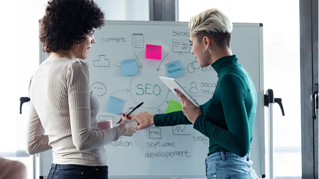 image of two women working for a SEO company Miami