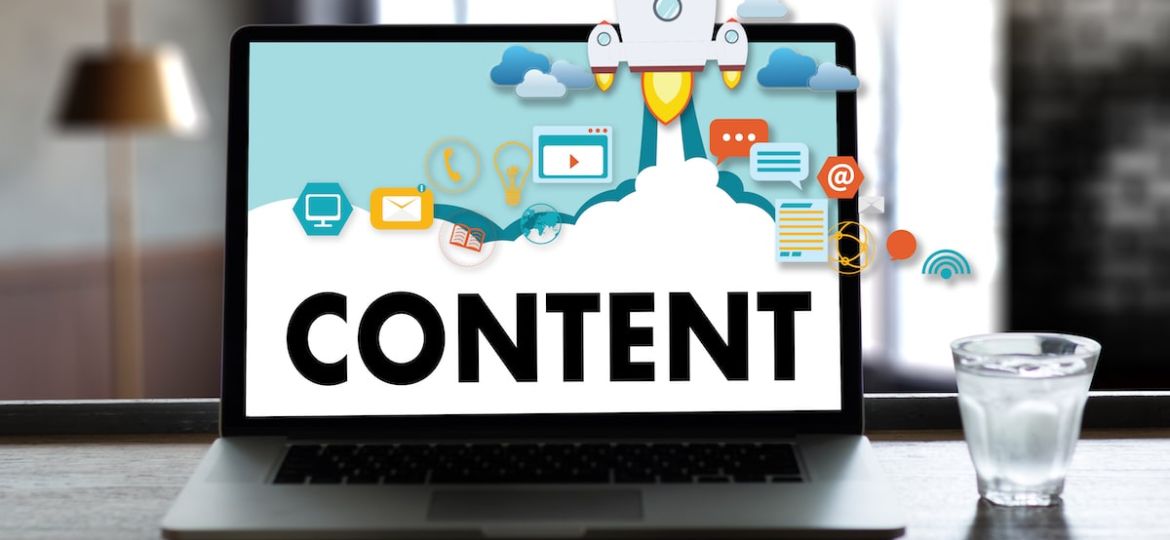 A computer with the word content rocketing up–signifying a successful content marketing strategy