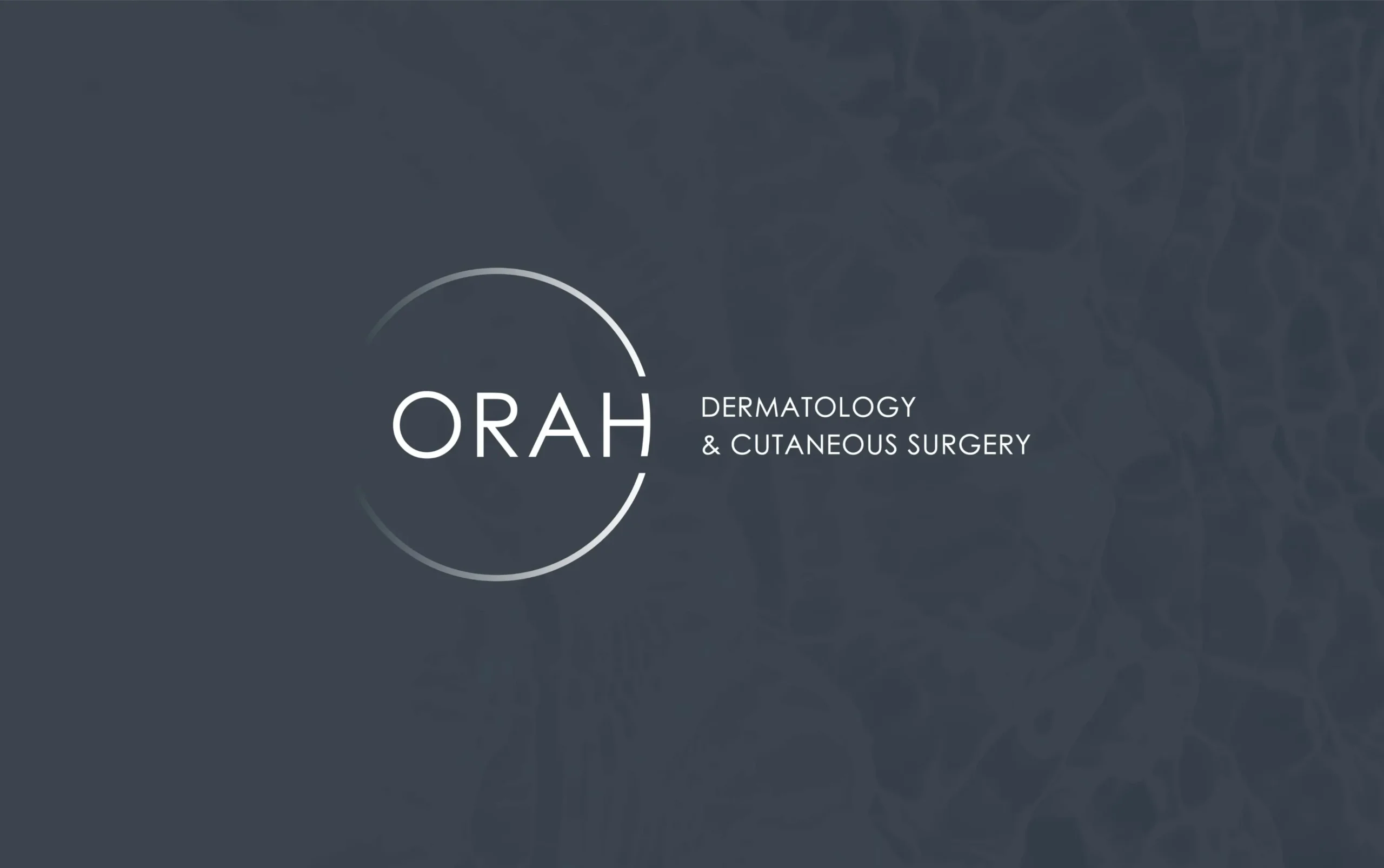 ORAH Dermatology & Cutaneous Surgery logo on a sleek gray background.