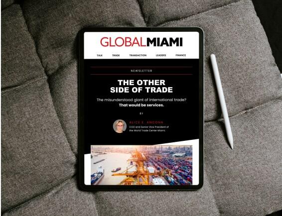 Tablet displaying a digital magazine cover titled "Global Miami," focused on international trade.