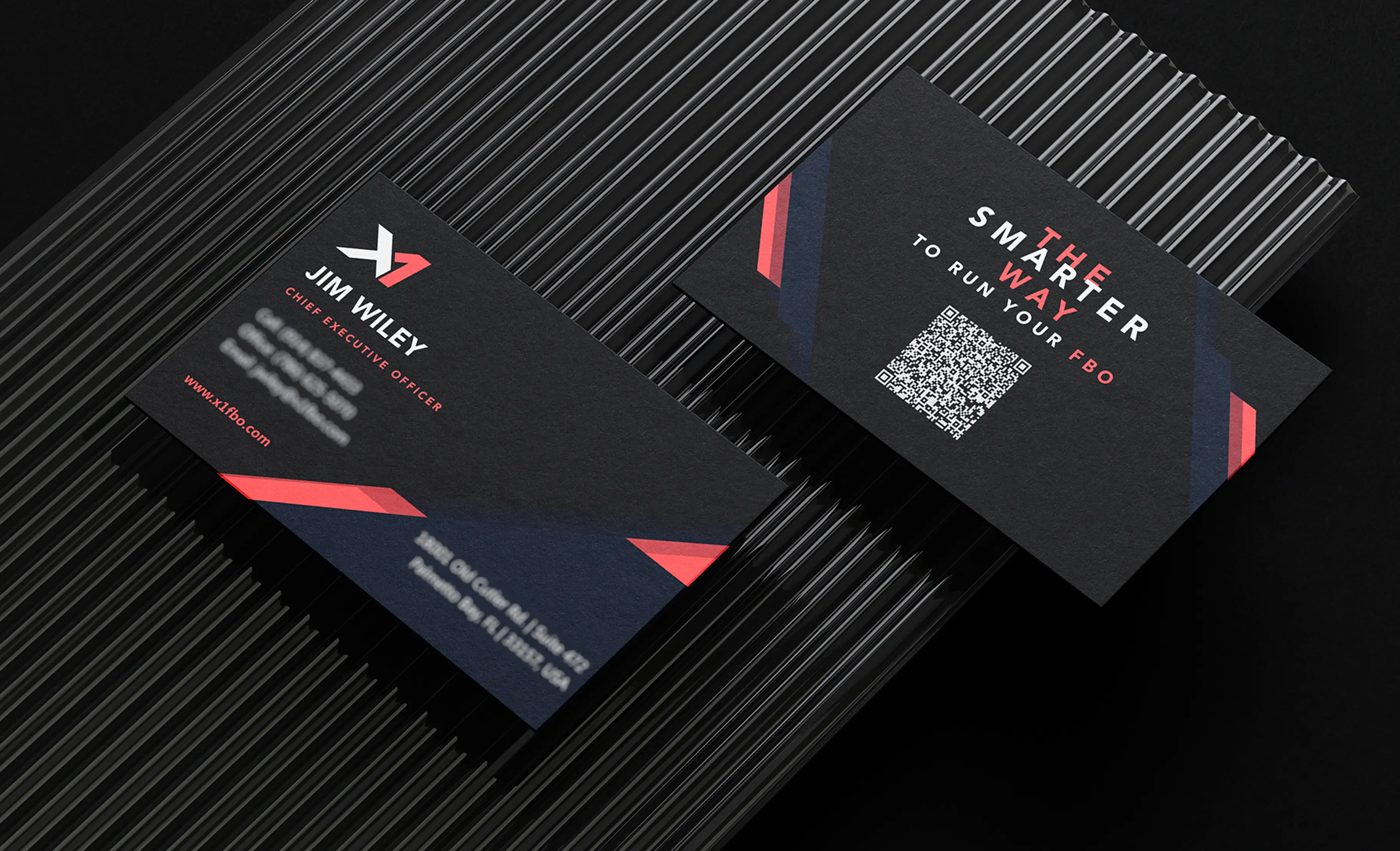 Sleek black business cards with modern red and white accents and QR code design.