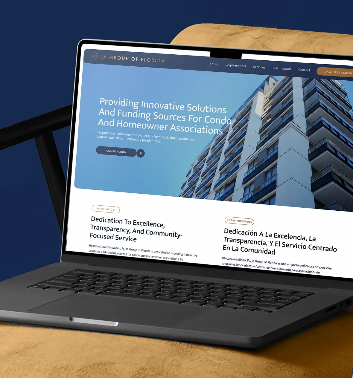Laptop displaying website for condo association solutions and funding on a cushioned chair.